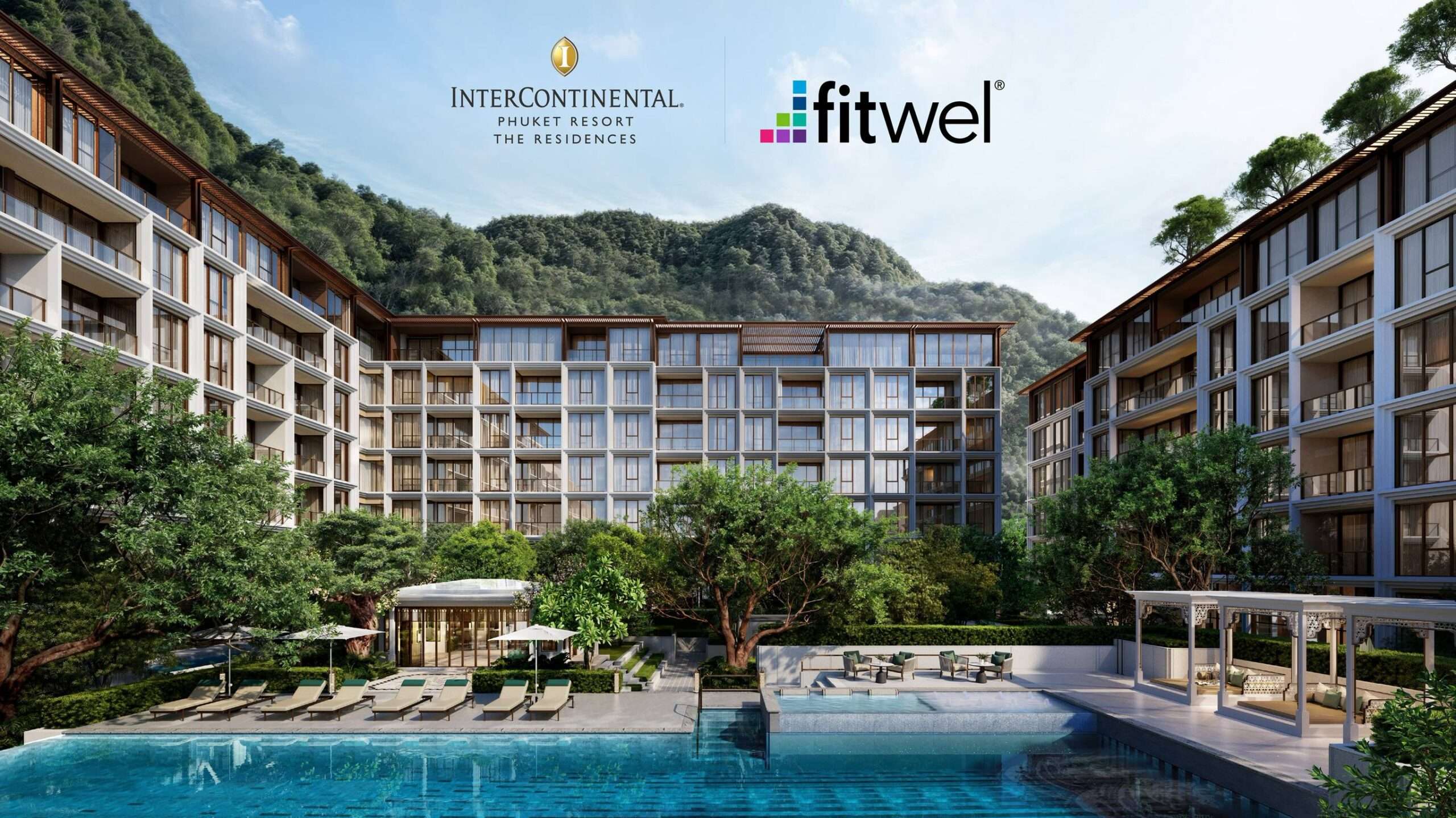 ภาพจำลองทัศนียภาพภายนอกของโครงการ The Residences at InterContinental Phuket Resort แสดงให้เห็นอาคารที่พักอาศัยล้อมรอบสระว่ายน้ำและพื้นที่สีเขียว พร้อมโลโก้แบรนด์ InterContinental และโลโก้มาตรฐาน Fitwel ด้านบน