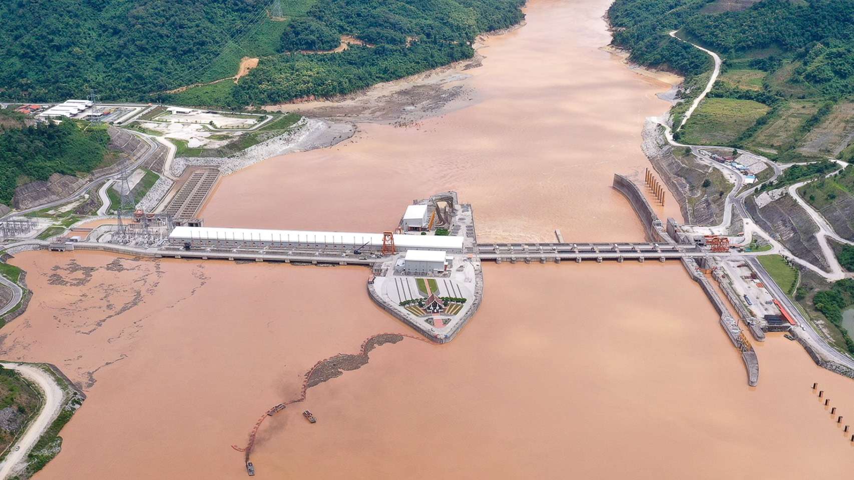 ภาพมุมสูงของโรงไฟฟ้าพลังน้ำ ไซยะบุรี (XPCL) สปป.ลาว ที่มีปริมาณน้ำไหลผ่านเพิ่มขึ้น ส่งผลดีต่อผลประกอบการของ CKPower